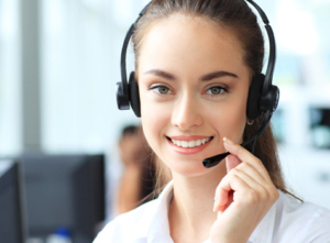 Smiling woman with headset in office.