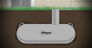 Underground propane tank near a house.