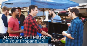 A man cooking on an outdoor grill.