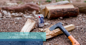 A can of beer and some wood on the ground.