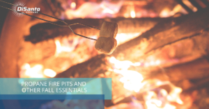 A fire pit with some wood burning in it