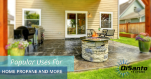 A patio with chairs and fire pit in it