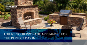 A patio with an outdoor fireplace and grill.